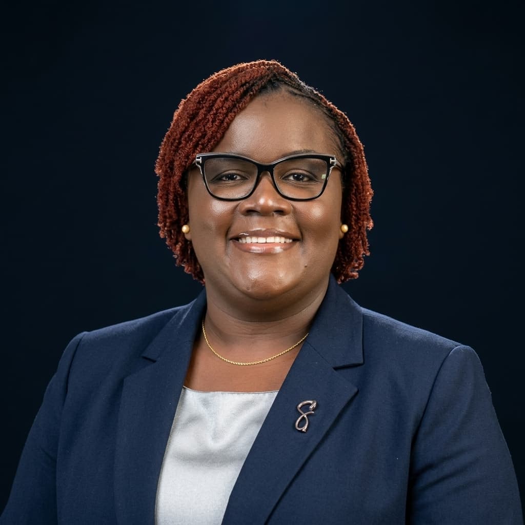 Official portrait of Jacqueline Ingutiah in a navy suit