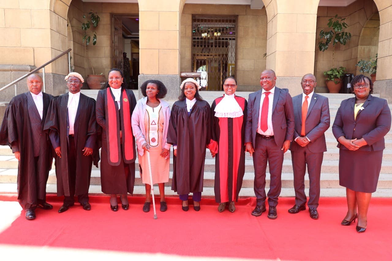 Jacqueline Ingutiah with the Chief Justice, Judges and a newly admitted advocate on the Supreme Court steps