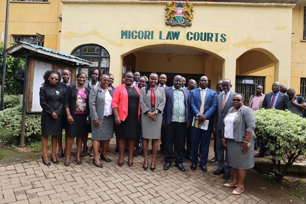 Jacqueline Ingutiah with judicial staff outside Migori Law Courts